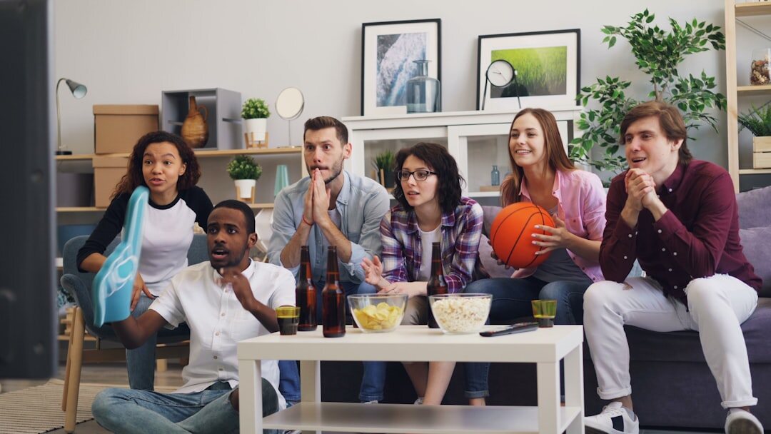 people watching tv together
