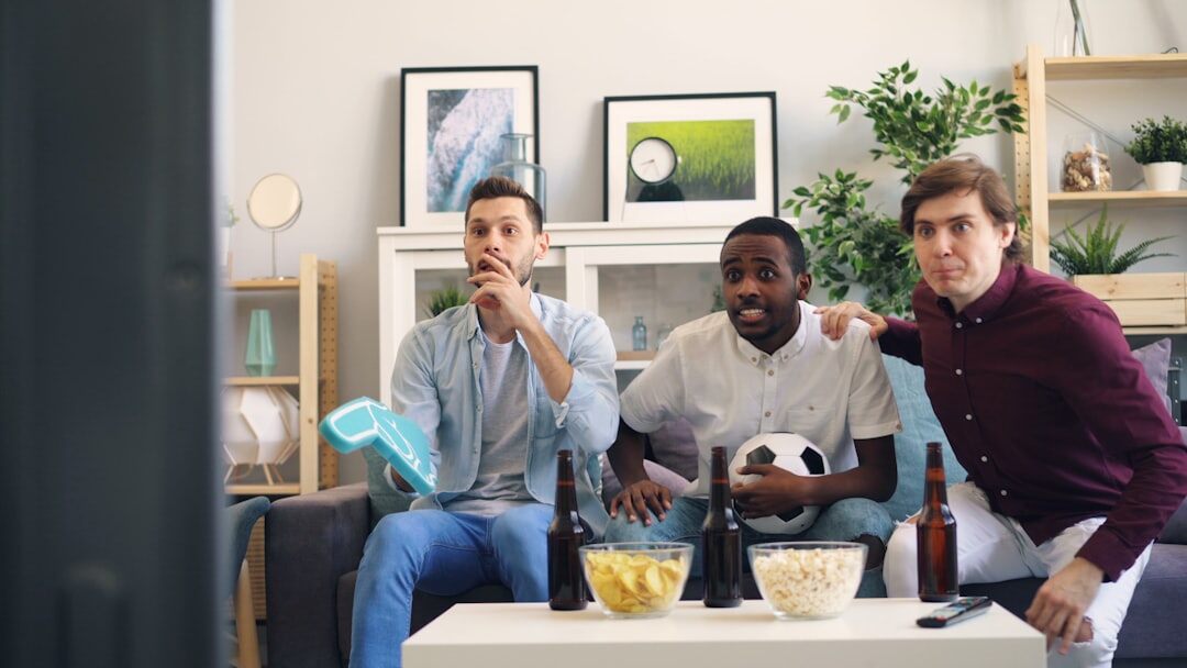 group of friends watching tv together