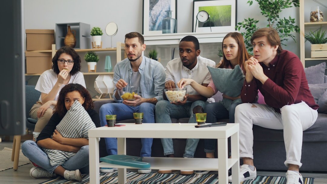 group watching television